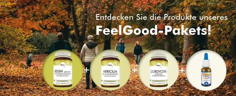 MycoVital_ Vier Personen gehen in einem Park mit Herbstlaub spazieren. Drei Nahrungserg&auml;nzungsflaschen mit der Aufschrift Reishi, Hericum und Cordyceps sowie eine Tinkturflasche stehen im Vordergrund. Der deutsche Text wirbt f&uuml;r ein FeelGood-Paket.